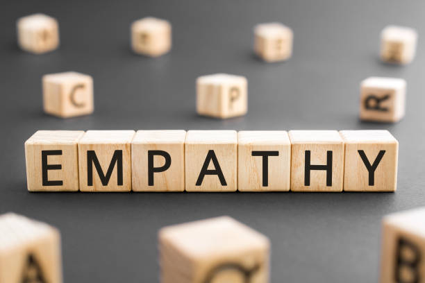 Empathy concept, random letters around black background